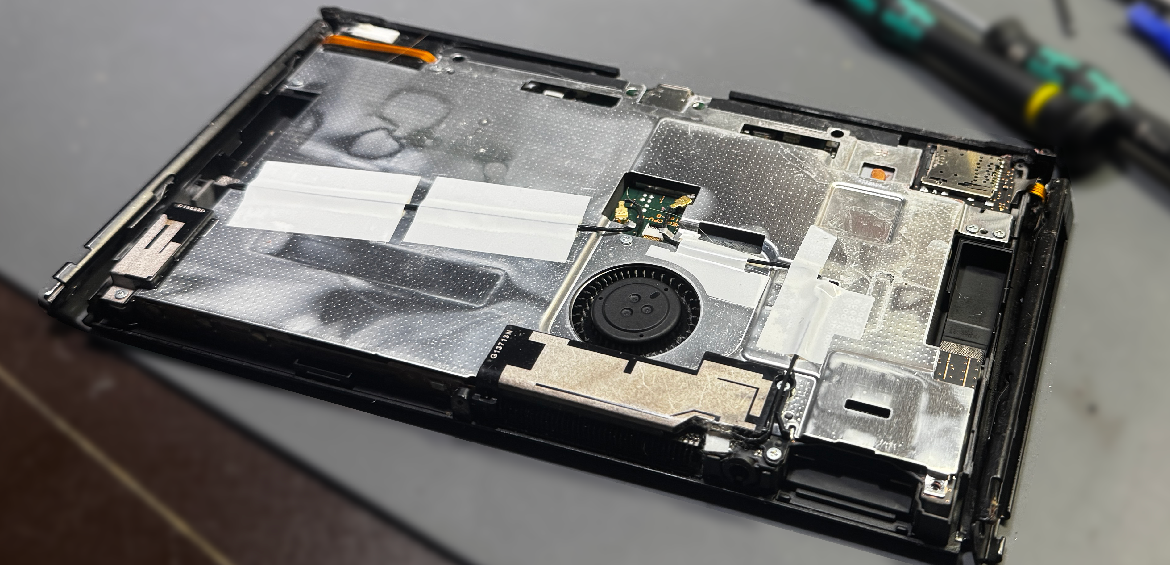 Opened Nintendo Switch console on repair bench ready for diagnostics and repair