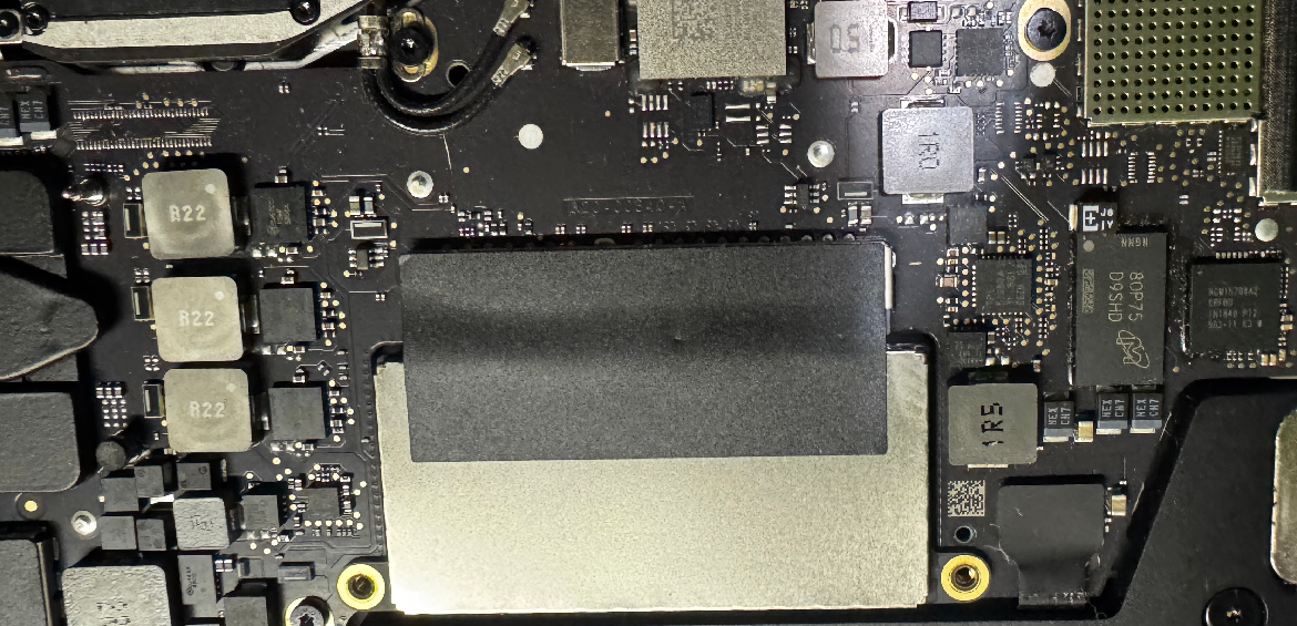 MacBook Pro internal logic board hardware inspection for component level repair